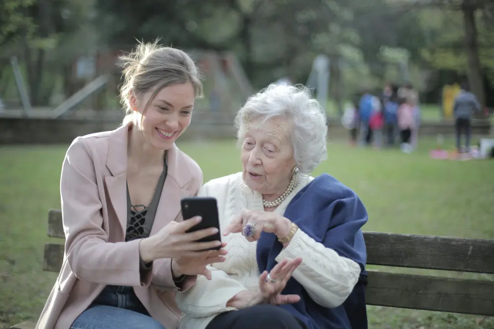 women on park bench - Blue Water Homecare women on park bench